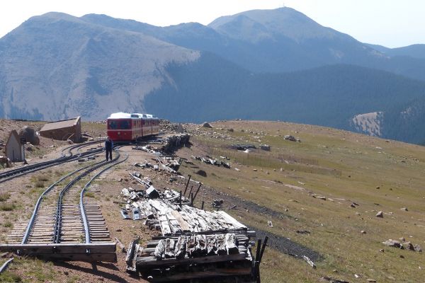 Cog railway train approaching the top of Pikes Peak at 14,115 feet