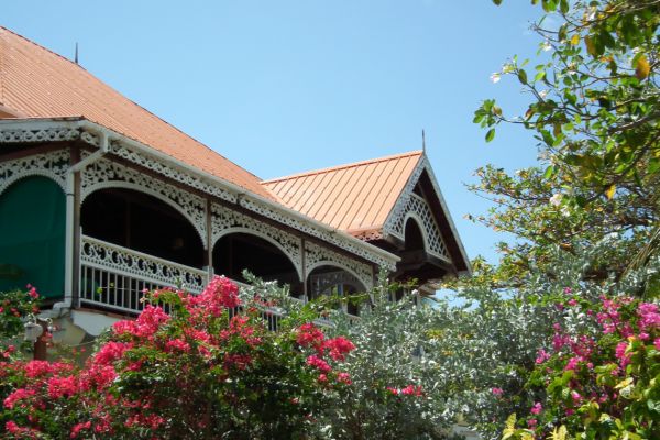 Wooden house with cast iron detail on Bequia