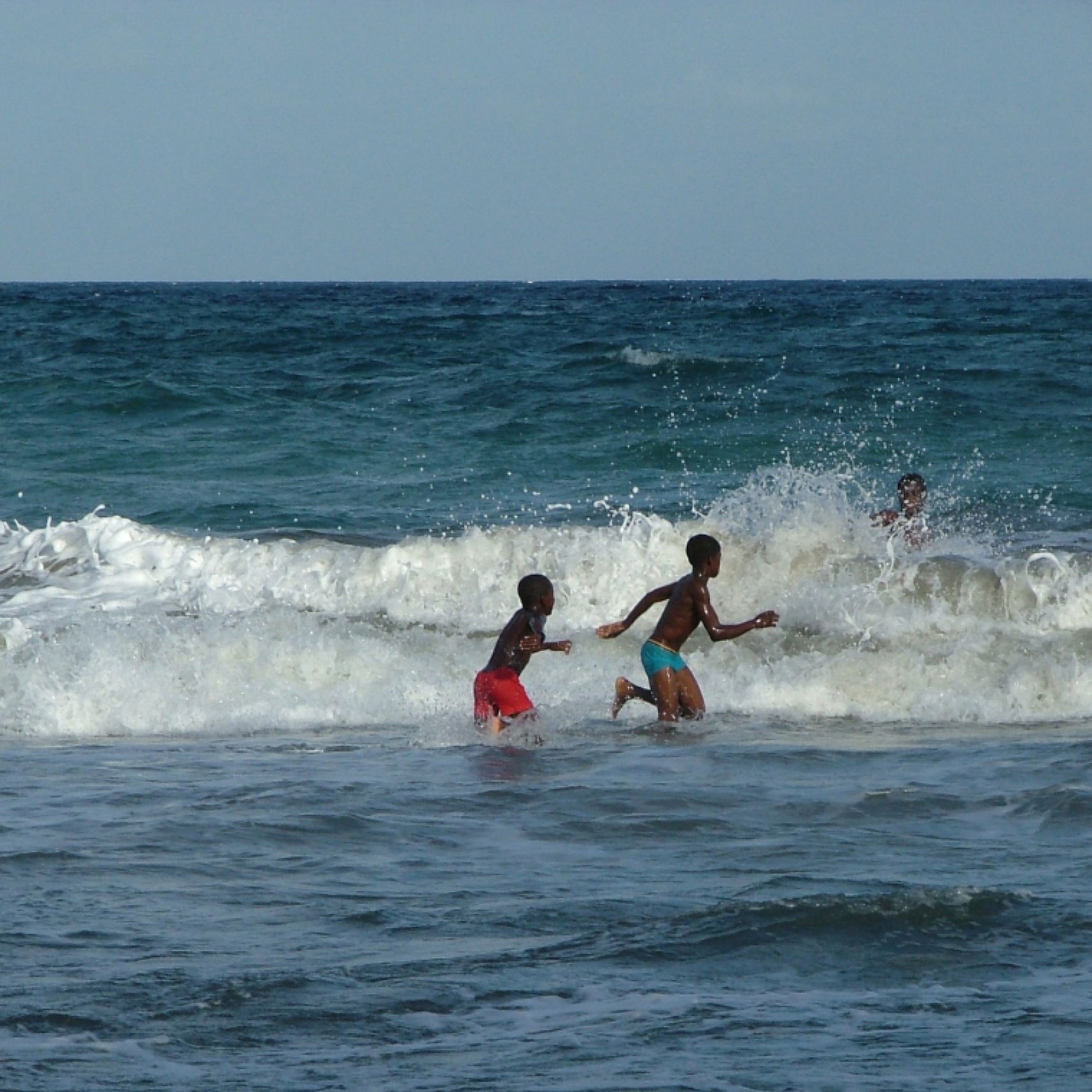 Grenada boys in surf